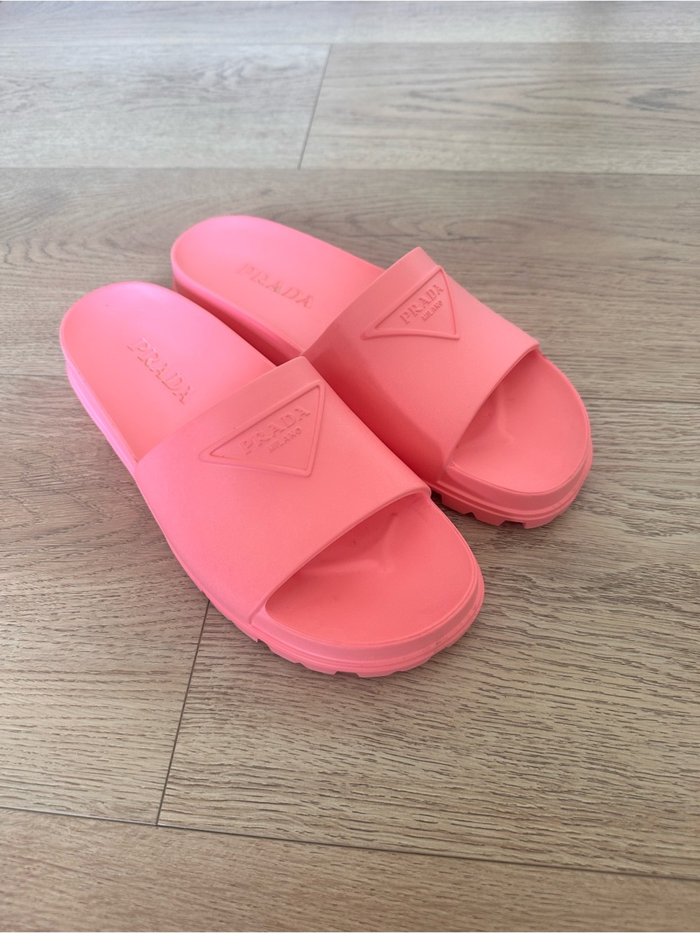 Prada triangle logo slides